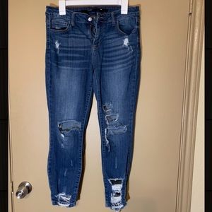 Slightly worn ripped skinny jeans